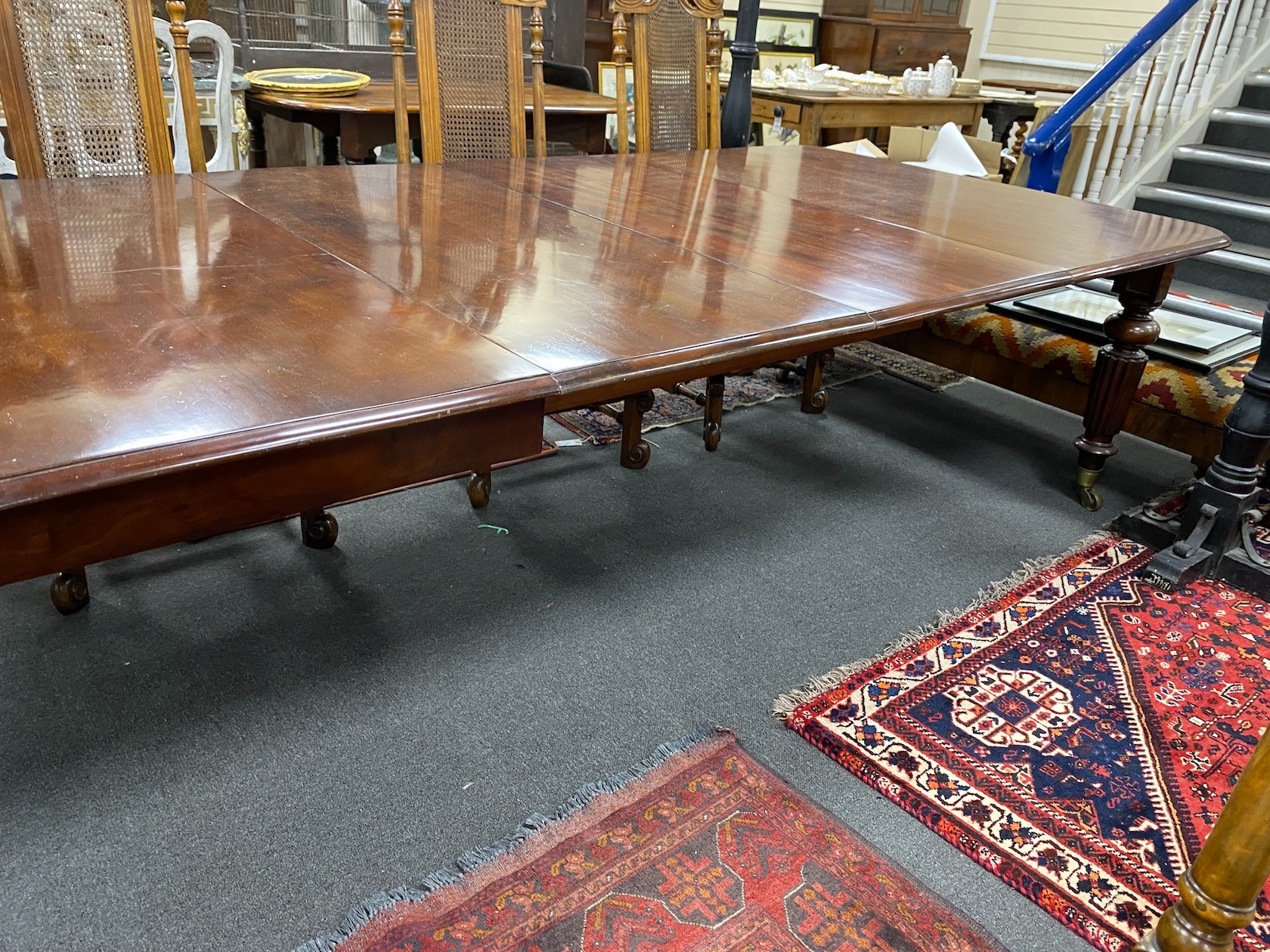 A Victorian mahogany extending dining table, 320cms extended, three spare leaves, depth 130cms, height 73cms.